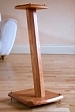 solid hardwood suppports tuned with a weighted steel plate under the hardwood foot